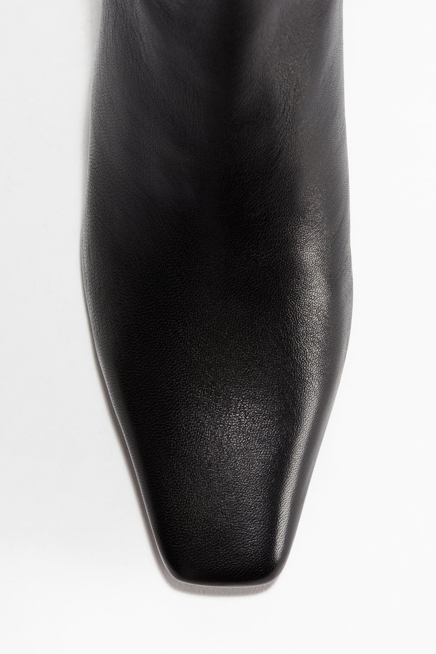 Heeled leather boots