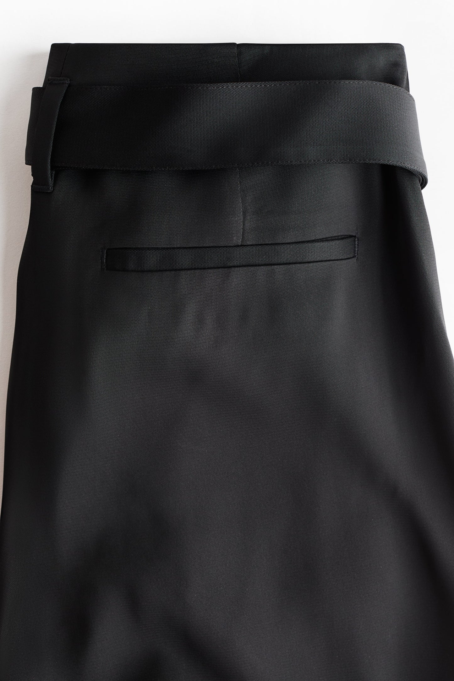 Belted pleat-detail trousers