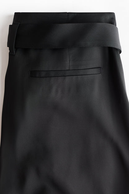 Belted pleat-detail trousers
