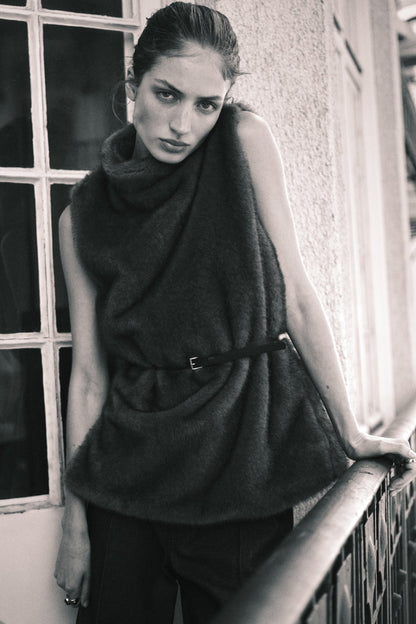 Belted turtleneck top