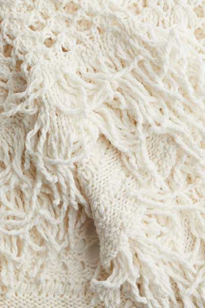 Fringe-trimmed hole-knit dress