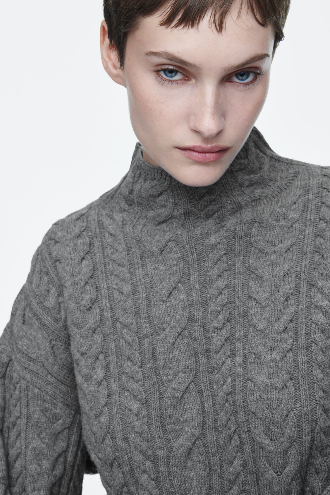 Cable-knit wool funnel-neck jumper