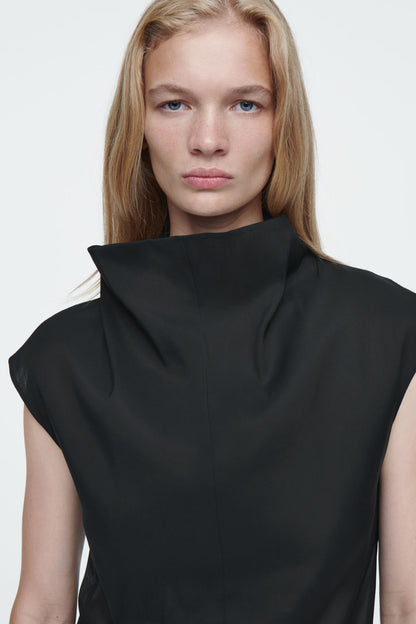 The sheer sleeveless top