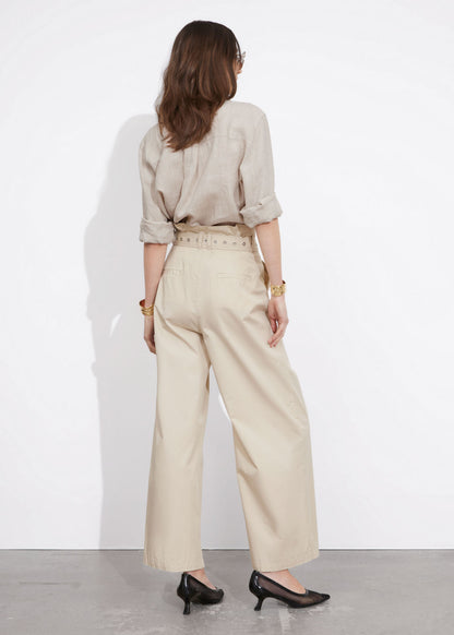 Eyelet-belt paperbag trousers