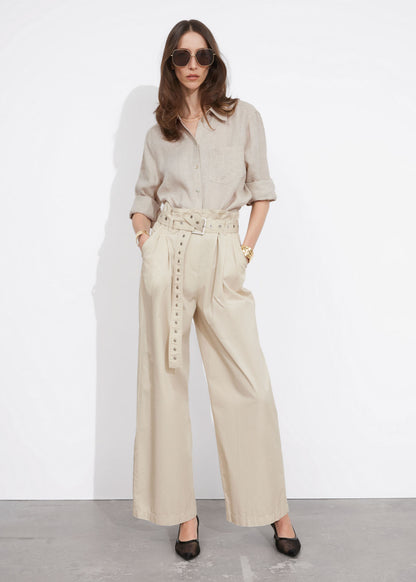 Eyelet-belt paperbag trousers