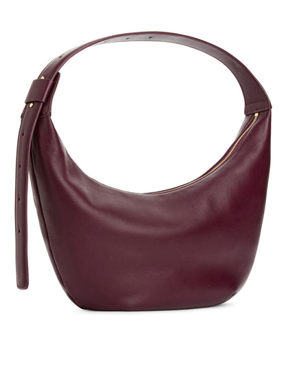 Mid size curved shoulder bag