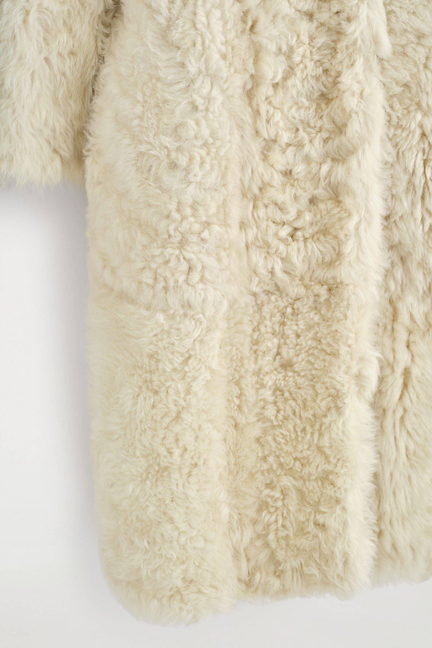 Collarless Shearling Coat