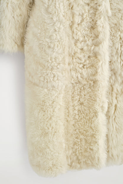 Collarless Shearling Coat