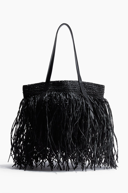 Fringed straw handbag