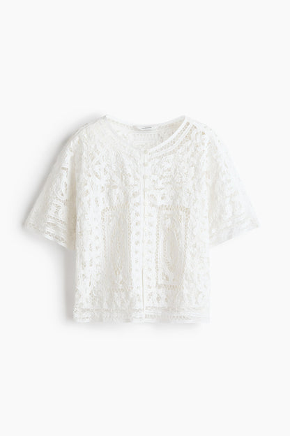 Oversized crochet-look blouse