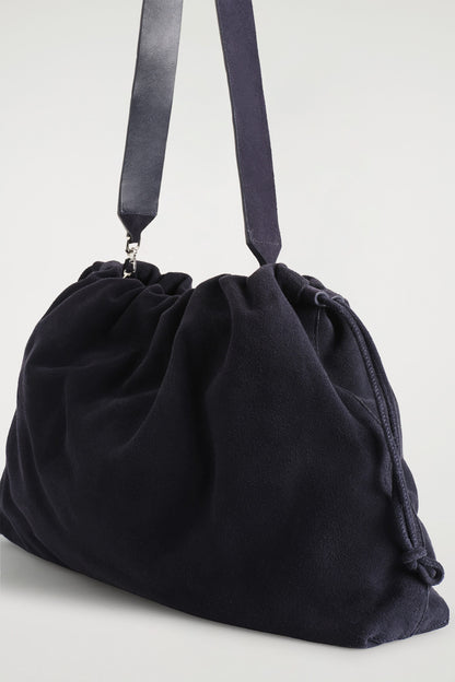 Cavatelli Clutch Suede Bag