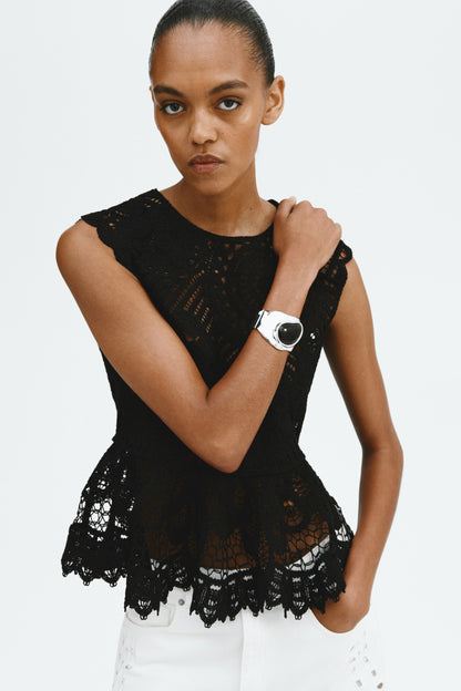 Crochet-look peplum top