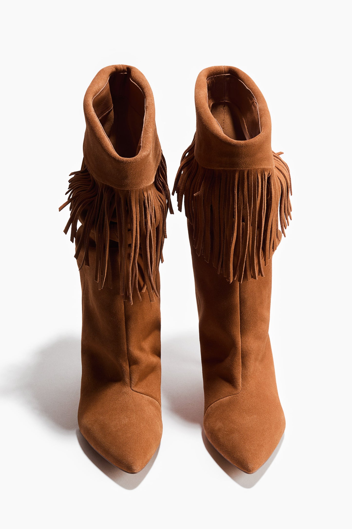 Fringe-trimmed suede boots