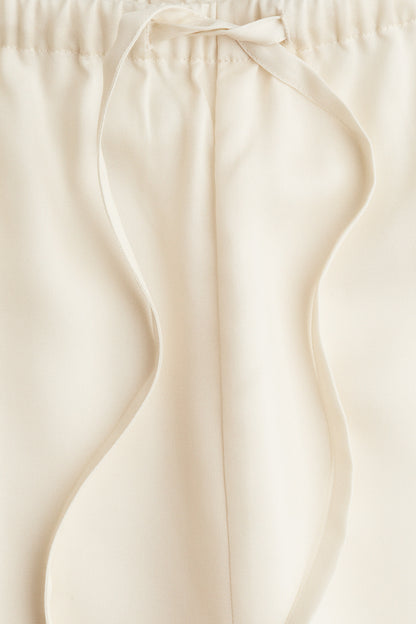 Printed drawstring trousers