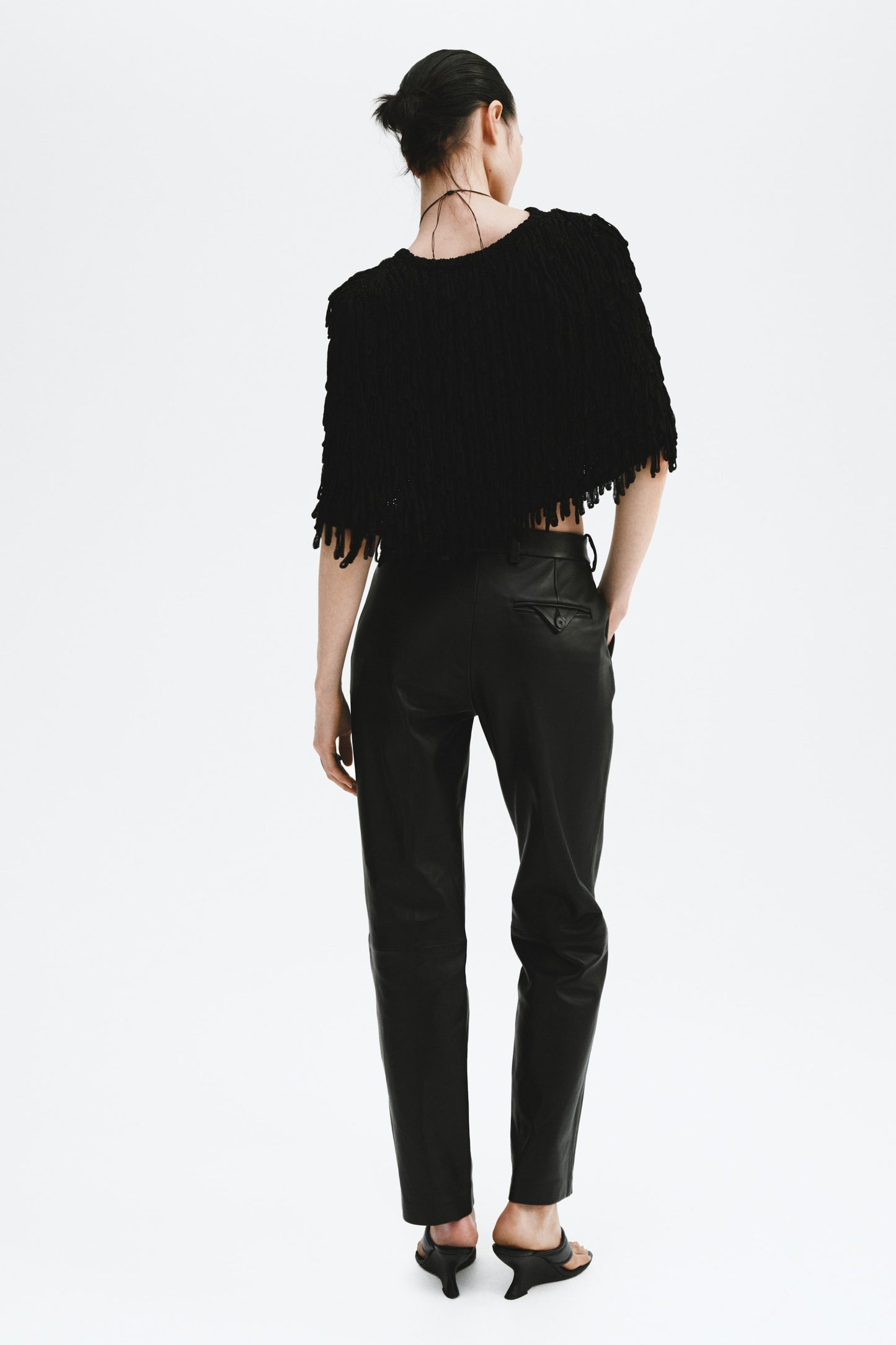 Fringed rib-knit cape
