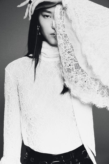Trumpet-sleeved lace blouse
