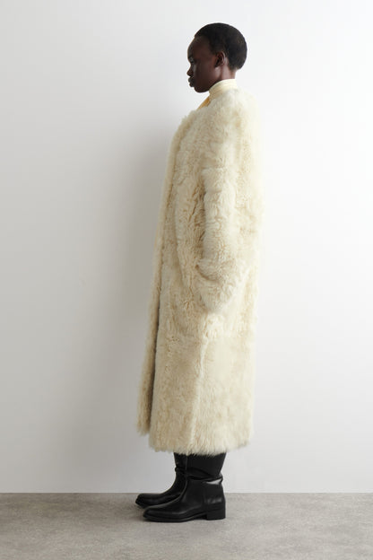 Collarless Shearling Coat