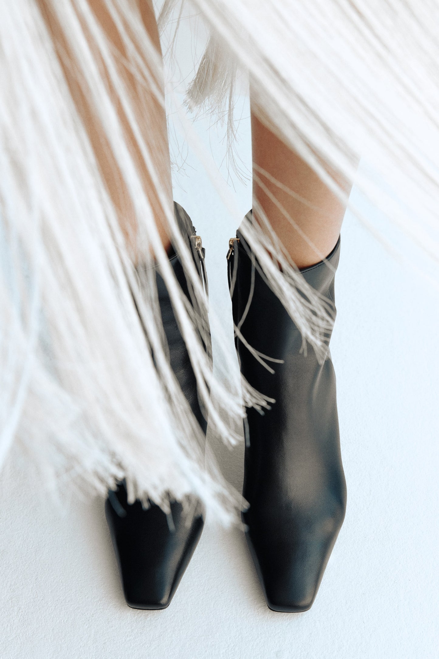 Heeled leather boots