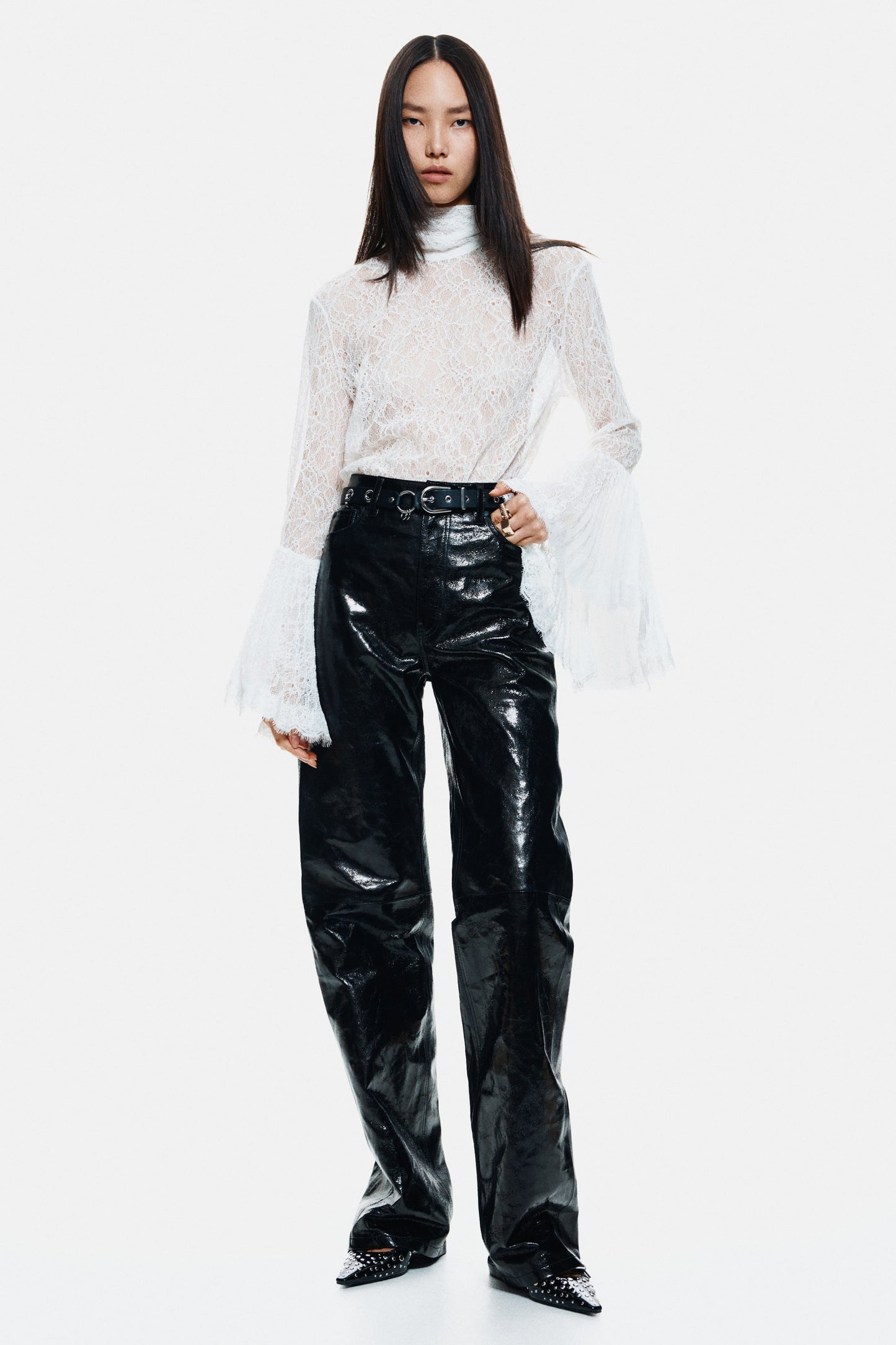 Trumpet-sleeved lace blouse