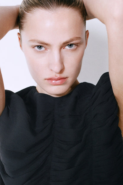 Gathered panelled top