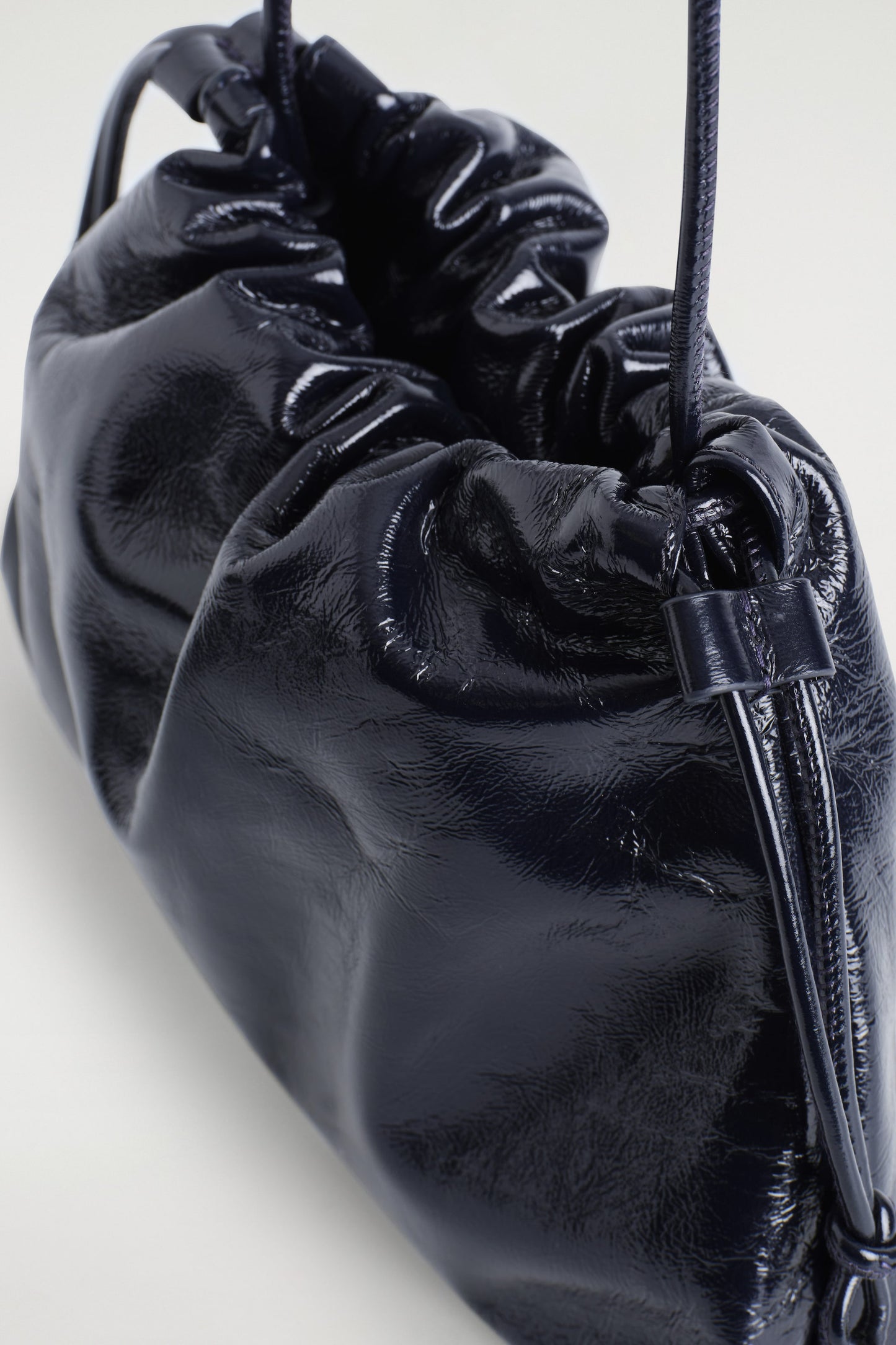 Mini Cavatelli Leather Clutch Bag