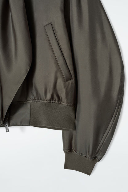 Scarf-detail padded silk bomber jacket