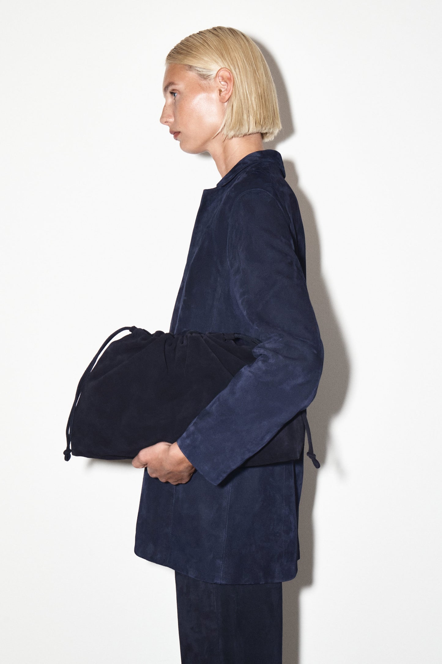 Cavatelli Clutch Suede Bag