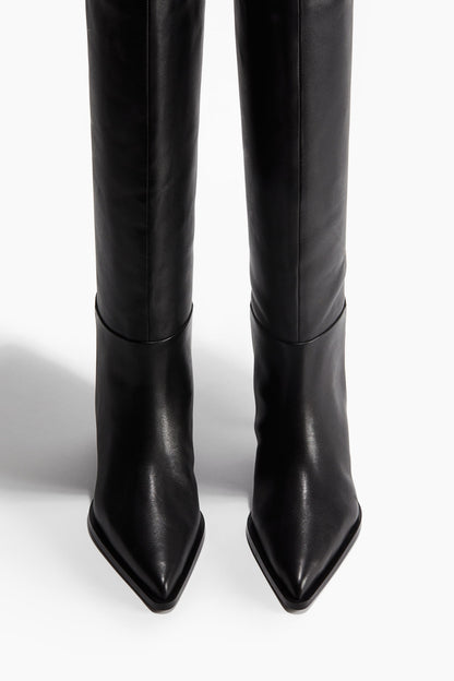 Pointed knee-high leather boots