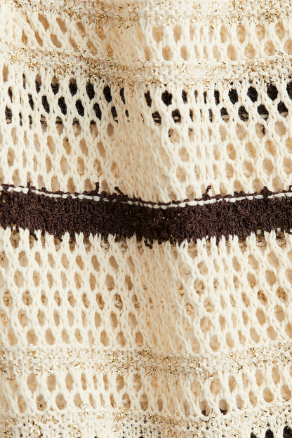 Shimmering hole-knit top