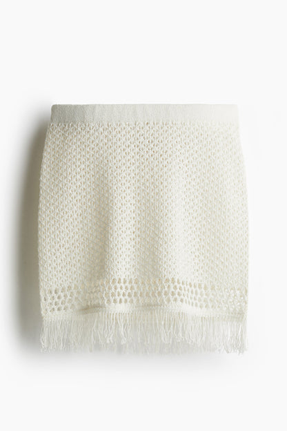 Fringe-trimmed pointelle-knit skirt