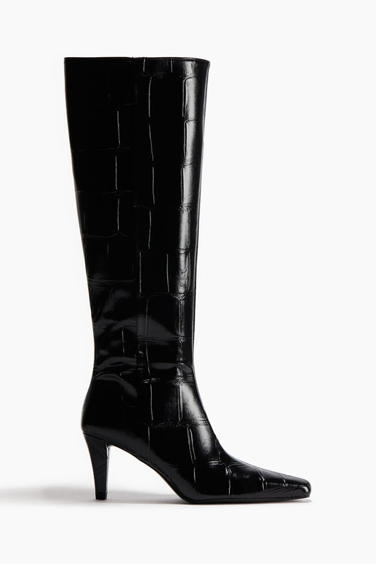 Heeled knee-high boots