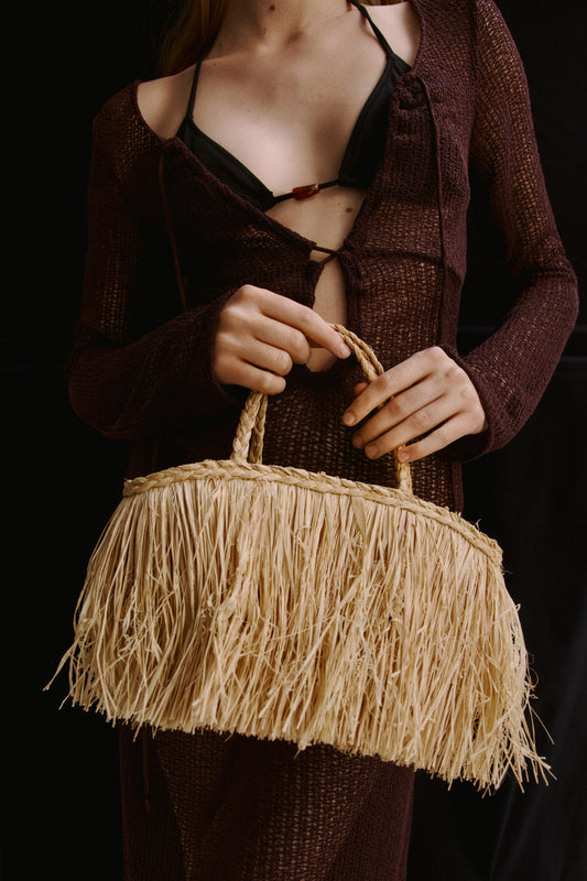 Fringed straw bag