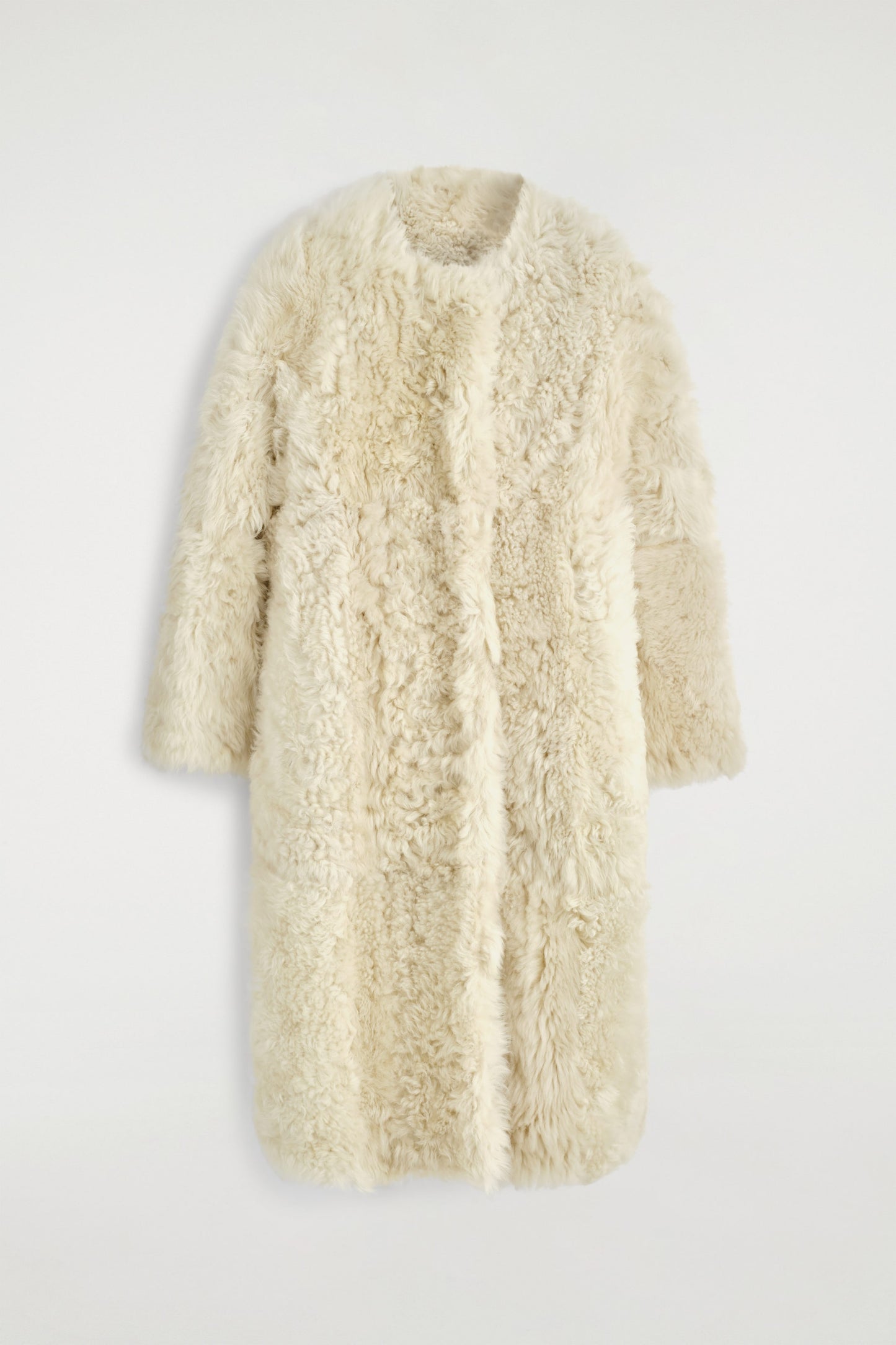 Collarless Shearling Coat