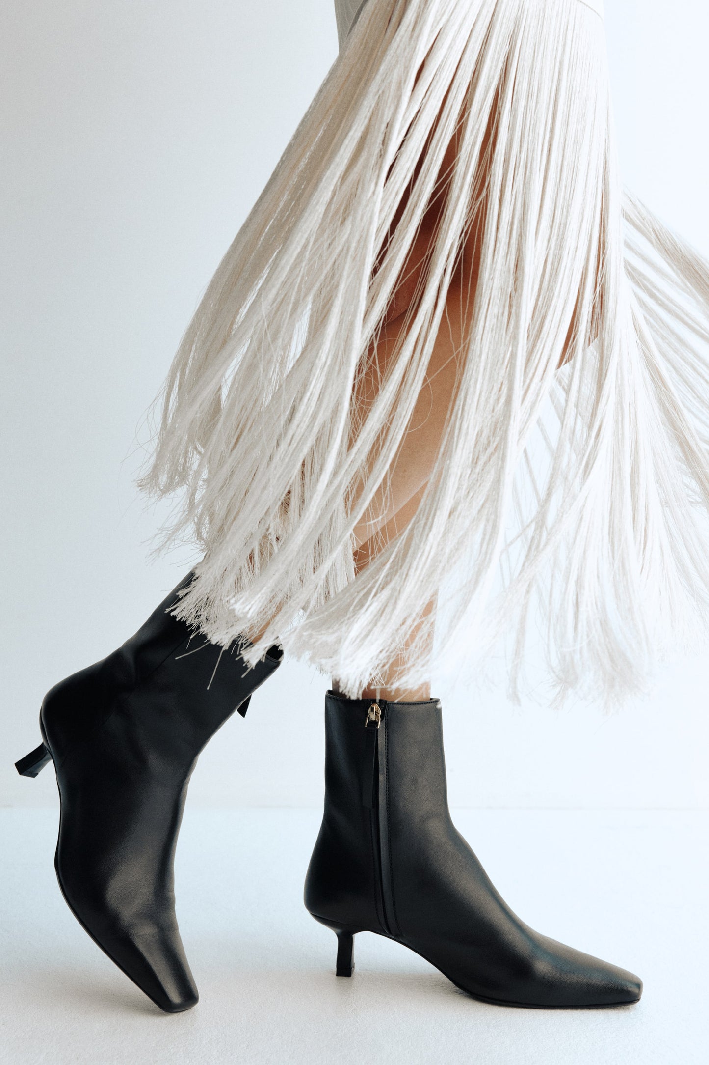 Heeled leather boots