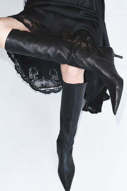 Heeled leather sock boots