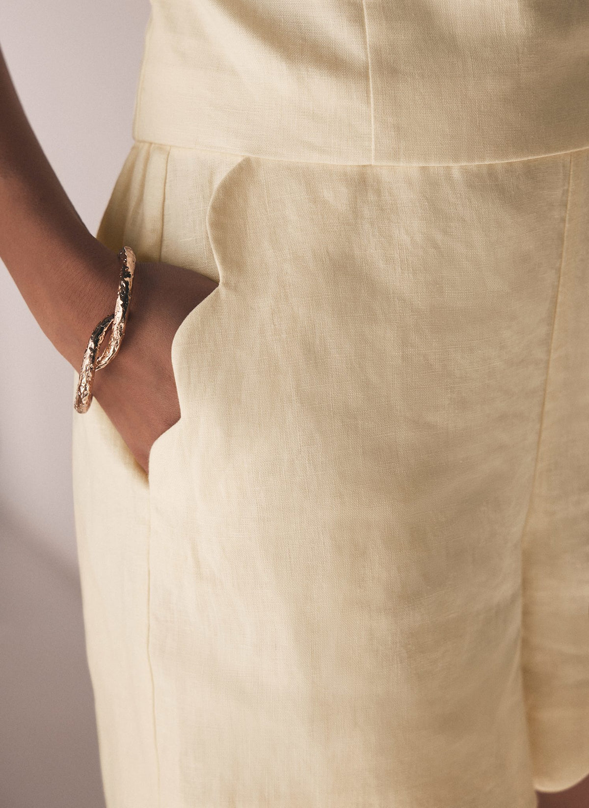 Gold Tone Twisted Bangle